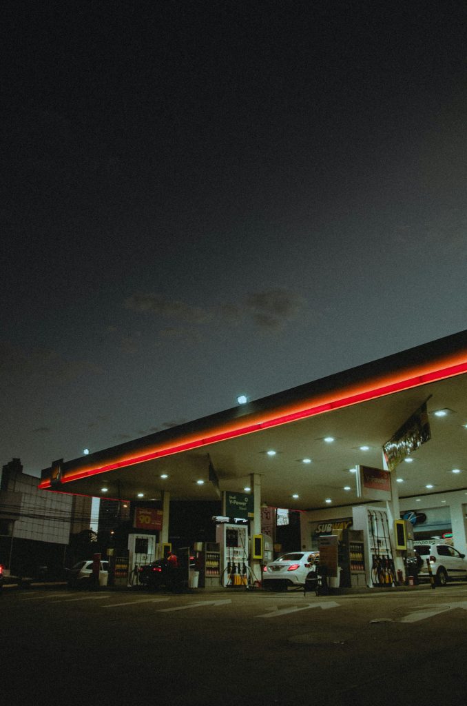 White Car on Gas Station during Night